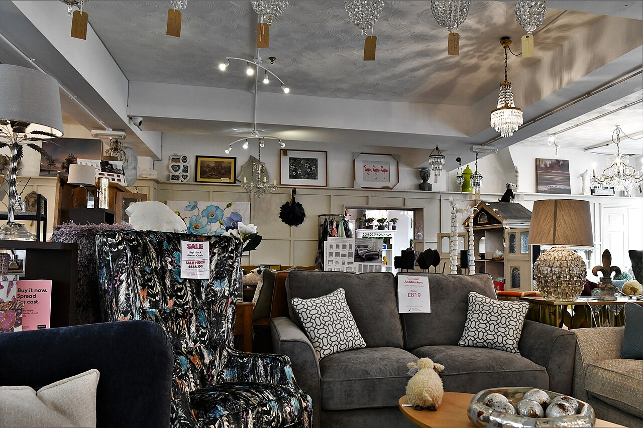 Sofas, chairs and lamps filling the showroom of a British furniture shop